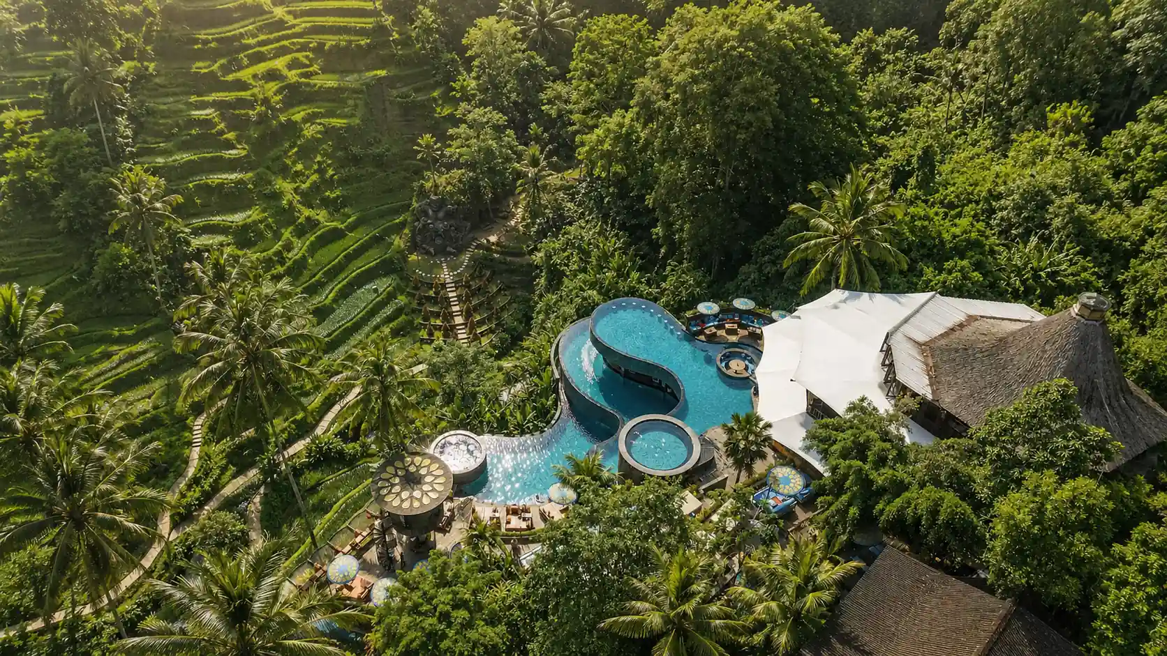 Aerial view of Cretya Ubud surrounded by Tegallalang rice terraces and tropical jungle